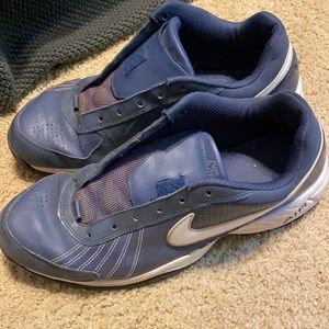 Blue Nike turf shoes. 11.5